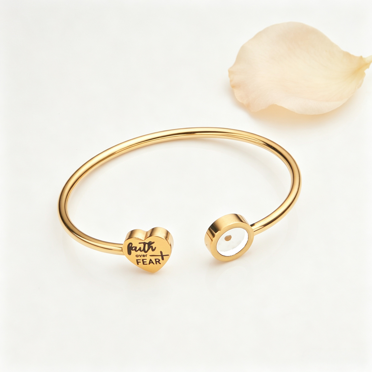 Gold plated stainless steel open cuff bangle with Faith Over Fear heart charm and mustard seed circle end